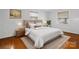 Stylishly staged bedroom featuring a comfortable bed and modern decor at 3501 Winterfield Pl, Charlotte, NC 28205