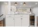 Modern kitchen featuring white cabinets, granite countertops, and stainless steel appliances at 3501 Winterfield Pl, Charlotte, NC 28205