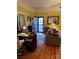 Charming home office with a classic desk, natural light, and cozy seating area at 400 Martin Luther King Jr Ave, Kannapolis, NC 28083
