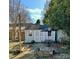 Outdoor shed with a table and chairs at 400 Martin Luther King Jr Ave, Kannapolis, NC 28083