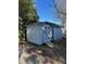Backyard features a storage shed with double doors and a ramp for easy access at 400 Martin Luther King Jr Ave, Kannapolis, NC 28083
