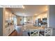 Spacious kitchen with granite countertops, stainless steel appliances, and an adjacent dining area at 443 Zender Ln, Monroe, NC 28112