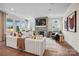 Bright, airy living room with a brick fireplace, modern decor, and lots of natural light at 4762 Formation Ct # 062, Lancaster, SC 29720