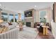 Bright, airy living room with a brick fireplace, modern decor, and lots of natural light at 4762 Formation Ct # 062, Lancaster, SC 29720