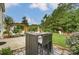 Outdoor entertaining area with stylish furniture, barbecue, and manicured lawn at 5006 Sand Trap Ct # 142, Monroe, NC 28112