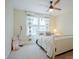 Comfortable bedroom features a bed, ceiling fan, window and curtains at 5006 Sand Trap Ct # 142, Monroe, NC 28112