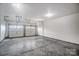 Spacious two car garage with large white doors at 5006 Sand Trap Ct # 142, Monroe, NC 28112