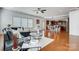 Bright living room with hardwood floors, recessed lights, and an open-concept design at 5006 Sand Trap Ct # 142, Monroe, NC 28112