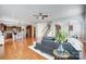 Open-concept living room showcasing the kitchen, dining area, and staircase at 5006 Sand Trap Ct # 142, Monroe, NC 28112