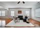 Inviting living room with hardwood floors, recessed lighting, and a cozy seating area at 5006 Sand Trap Ct # 142, Monroe, NC 28112