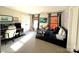 This bedroom features a gaming setup and a large bed with an interesting blanket at 6301 Royal Aberdeen Ct, Charlotte, NC 28277