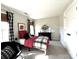 Bedroom featuring Buffalo-checked curtains and a decorative hexagonal shelf at 6301 Royal Aberdeen Ct, Charlotte, NC 28277