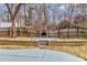 Backyard featuring a brick fireplace with a concrete patio and wooden fence at 733 Rocky Grove Gln, York, SC 29745