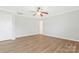 Empty bedroom with vinyl flooring, a ceiling fan and a closet at 733 Rocky Grove Gln, York, SC 29745