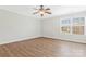 Bedroom with vinyl flooring, a ceiling fan, and a window with blinds at 733 Rocky Grove Gln, York, SC 29745