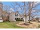Inviting two-story home showcasing a well-maintained lawn and a cozy covered front porch at 733 Rocky Grove Gln, York, SC 29745