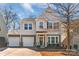 Charming home with a well-maintained lawn, two-car garage and inviting front porch at 8028 Tricia Pointe Pl, Indian Land, SC 29707