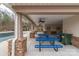 Community pool area with picnic tables, an outdoor grilling area, and ample seating at 8028 Tricia Pointe Pl, Indian Land, SC 29707
