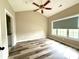 Bedroom featuring a large window for natural light at 8668 Coralbell Ln # 10, Charlotte, NC 28213
