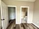 Bedroom with an ensuite bathroom and a walk-in closet at 8668 Coralbell Ln # 10, Charlotte, NC 28213