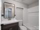 Updated bathroom featuring a modern vanity, subway tile, and a shower-tub combination at 910 Mcdow Dr, Rock Hill, SC 29732