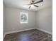 Bright bedroom with hardwood floors and a large window at 910 Mcdow Dr, Rock Hill, SC 29732