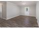 Open-concept living room featuring modern laminate flooring and neutral paint at 910 Mcdow Dr, Rock Hill, SC 29732