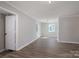 Bright, freshly painted living room with new laminate flooring and natural light at 910 Mcdow Dr, Rock Hill, SC 29732