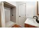 Bathroom featuring a glass shower with a rainfall shower head and a modern sink and vanity at 957 Hathcock Glen Dr, Oakboro, NC 28129