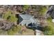 Aerial view of the home's roof and the surrounding mature trees at 10620 S Ford Rd, Charlotte, NC 28214