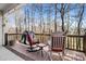 Back porch offering a serene view of the trees, complete with rocking chairs at 10620 S Ford Rd, Charlotte, NC 28214