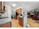 Kitchen view leading into the living room and dining room; stainless steel appliances at 10620 S Ford Rd, Charlotte, NC 28214