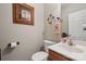 Traditional half bathroom with a framed print, decorative wall accents and a pedestal sink at 10620 S Ford Rd, Charlotte, NC 28214