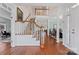 Elegant foyer with hardwood floors, grand staircase, and open view to the dining area at 108 Berkshire Ave, Belmont, NC 28012
