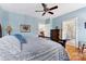 Spacious bedroom with a large bed and an open doorway to a tiled bathroom at 108 Berkshire Ave, Belmont, NC 28012