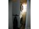 Bright laundry room with stackable washer and dryer, and a vacuum cleaner at 111 Scenic Ln, New London, NC 28127