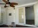 View of the outdoor patio featuring sliding glass doors, and a ceiling fan at 111 Scenic Ln, New London, NC 28127