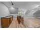 Unfurnished bonus room offers space for customization and features a wet bar and bright windows at 11280 Mcfalls Dr, Fort Mill, SC 29707