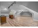 Unfurnished bonus room offers ample space for customization and features a wet bar and bright windows at 11280 Mcfalls Dr, Fort Mill, SC 29707