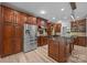 Spacious kitchen features custom wood cabinetry, stainless steel appliances, and a center island at 11280 Mcfalls Dr, Fort Mill, SC 29707
