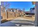 Fenced backyard with a concrete patio and garden beds at 13344 Craig Mill Ln, Huntersville, NC 28078