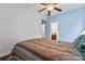 Bedroom with light blue accent wall featuring ensuite bathroom at 1485 Sierra Rd, York, SC 29745