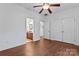 Bedroom with private bath has hardwood floors, ceiling fan and neutral color palette at 1485 Sierra Rd, York, SC 29745