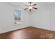 Bright bedroom with hardwood floors and a ceiling fan provides a blank canvas at 1485 Sierra Rd, York, SC 29745