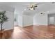 Expansive bonus room with ceiling fans, hardwood floors, and a peaceful atmosphere at 1485 Sierra Rd, York, SC 29745