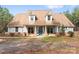 Charming single Gathering home features an inviting front porch with stone accents at 1485 Sierra Rd, York, SC 29745