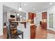 Modern kitchen with granite countertops, dark wood cabinets, and a breakfast bar at 1485 Sierra Rd, York, SC 29745