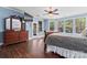 Open primary bedroom with hardwood floors, private door and lots of windows at 1485 Sierra Rd, York, SC 29745