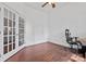 A functional home office with hardwood floors, French doors, and natural light at 1485 Sierra Rd, York, SC 29745