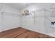 Walk-in closet with hardwood floors and wire shelving, offering plenty of storage space at 1485 Sierra Rd, York, SC 29745